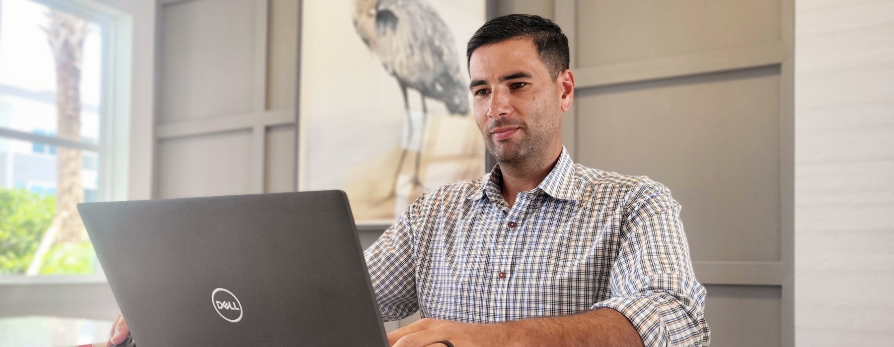 a man typing on a computer